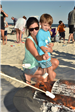 mom and son making smores