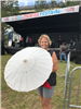 woman with a white zydeco umbrella