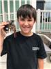 little boy holding a crawfish