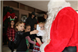 kids greeting Santa