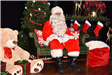 Santa sitting in chair