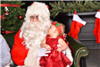 little girl looking at Santa