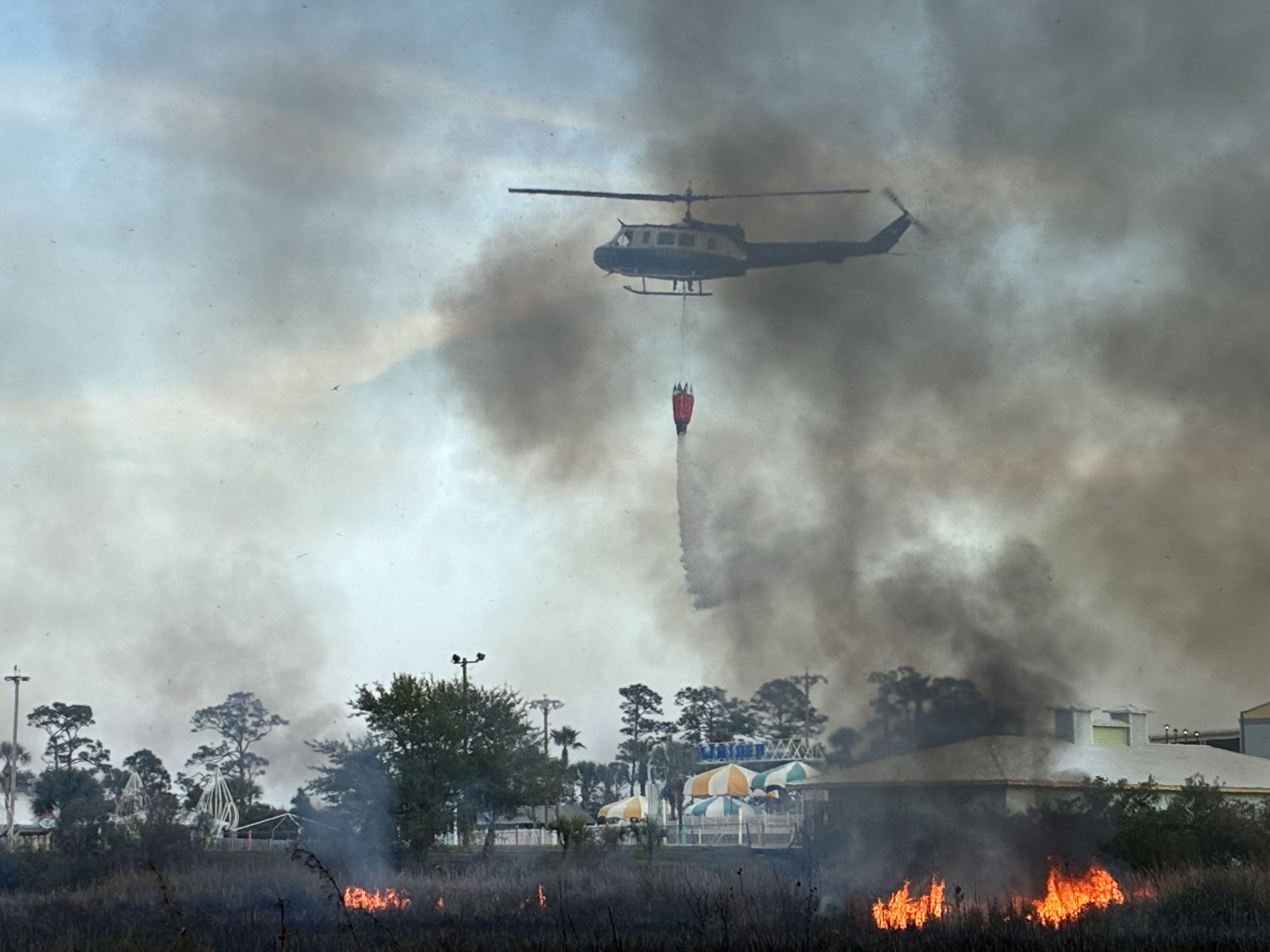 Gulf State Park Fire Helicopter Dropping Water